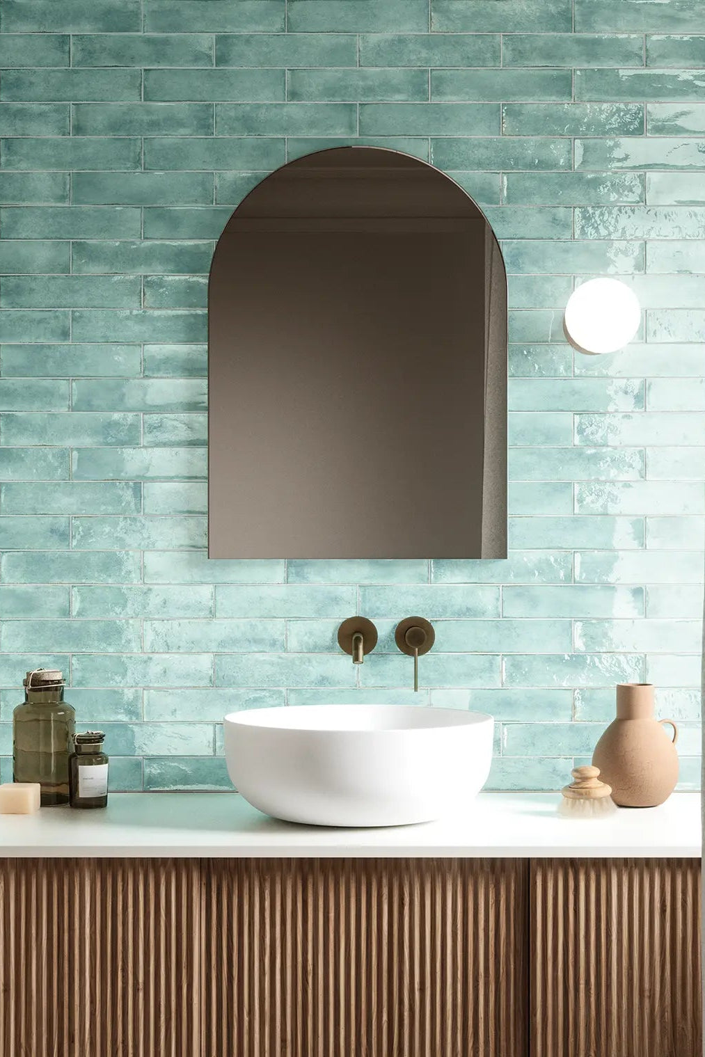 Vetra Acquamarina glossy Italian wall tile installed in a bathroom